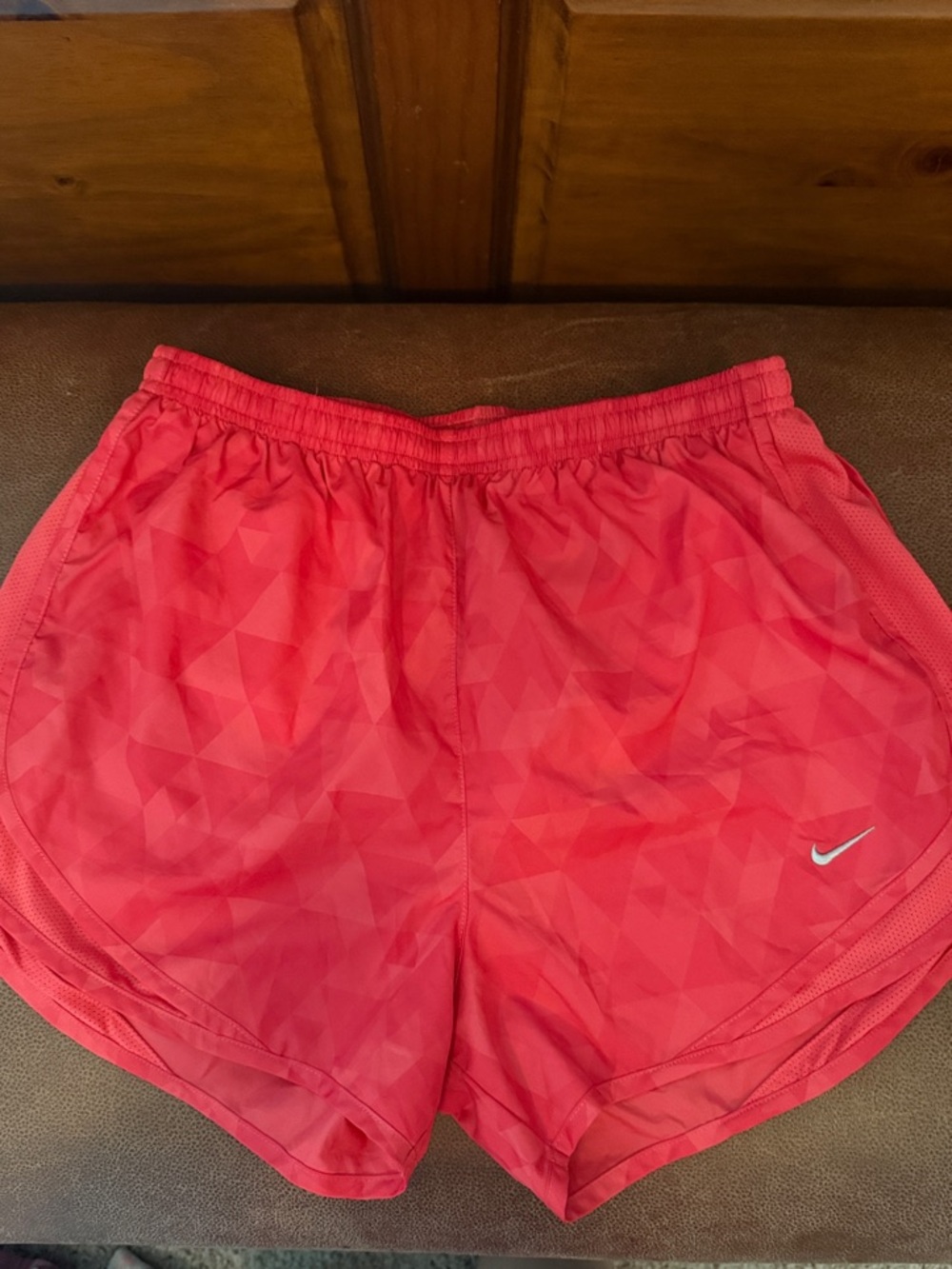 Nike Pink Coral Running Shorts with Subtle Geo Print